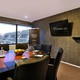 Boardroom with plasma screen and flipchart